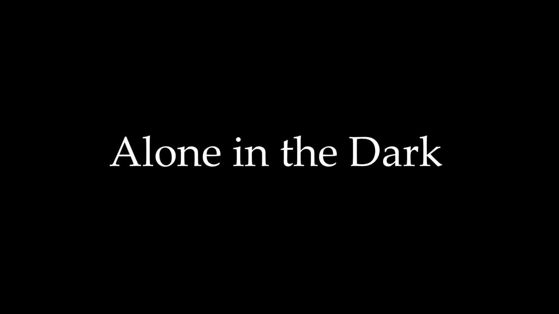 Alone in the dark poster.